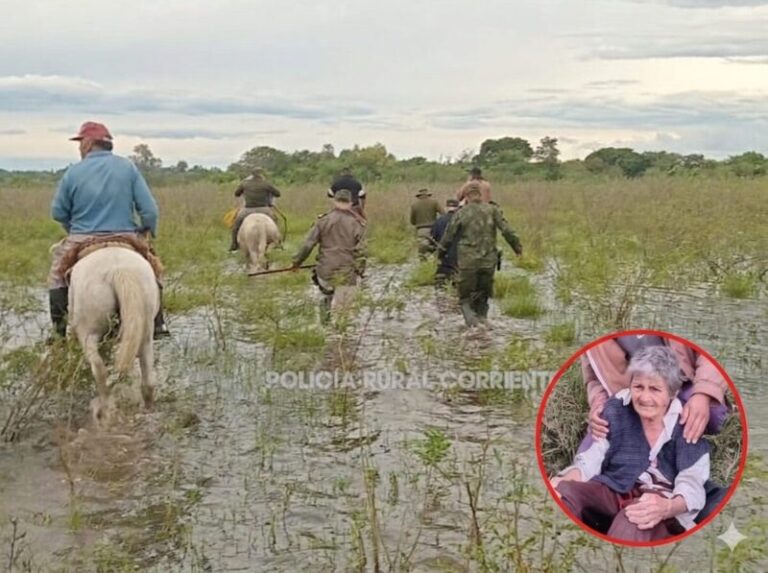 Efectivos policiales y vecinos durante el operativo de búsqueda en zona rural de Goya